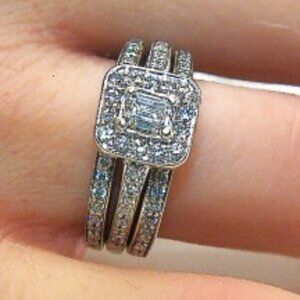 14 KT White Gold Trio Bridal Set 0.91 CTTW With a 0.38 ct Emerald Cut Diamond